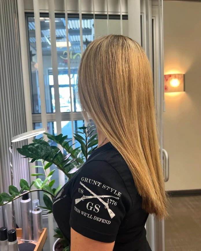 Long sleek straight blonde hair by MW Hair Salon